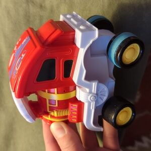 Stunt Dumper 360 Press & Roll Train Car Toy For Toddler